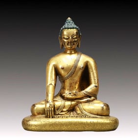 A Solemn Gilt Bronze Statue of Sakyamuni