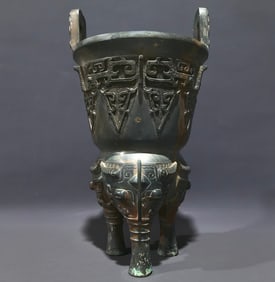 An Archaic Bronze Taotie Pattern Double-Ears and Tripod Food Vessel,With Inscription