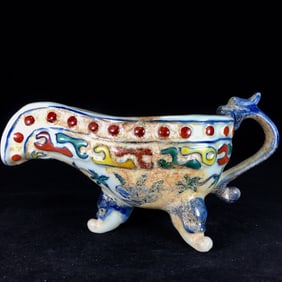 An Exquisite Doucai Dragon Pattern Tripod Goblet