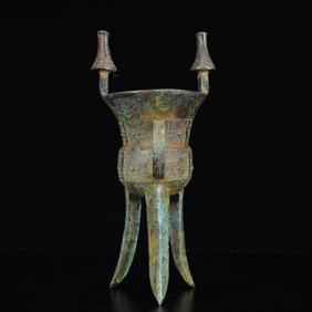 An Archaic Bronze Double-Ears and Tripod Cup