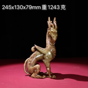 An Exquisite White Jade Dragon Ornament