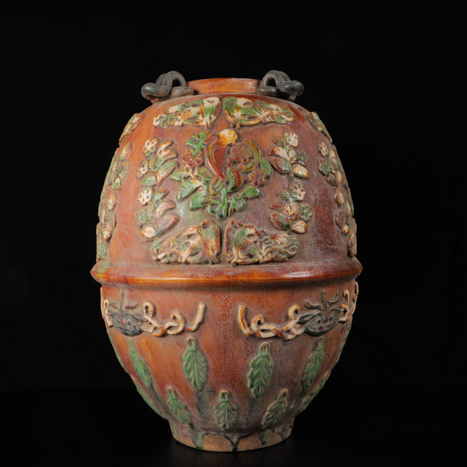 An Exquisite Tang Tri-Color Glazed Pottery Flower and Bird Pattern Jar: An Exquisite Tang Tri-Color Glazed Pottery Flower and Bird Pattern Jar,Tang Dynasty,China,Size:15.4inx11.4inx11.4in,Weight:5160g 唐三彩花鸟纹罐,中ࢲ