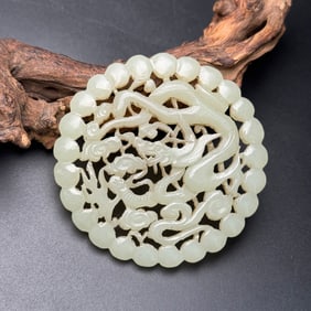 An Exquisite White Jade Dragon Pattern Pendant