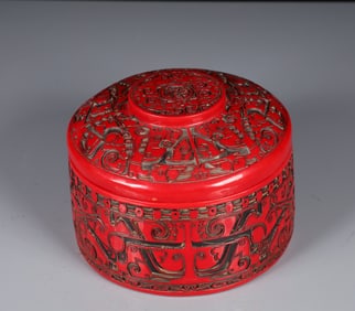 An Exquisite Carved Red Lacquer Beast-Face Pattern Box with Cover