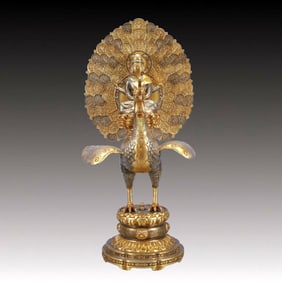 A Huge Gilt Silver Peacock Buddha Statue