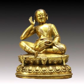 A Solemn Gilt Bronze Statue of Guru