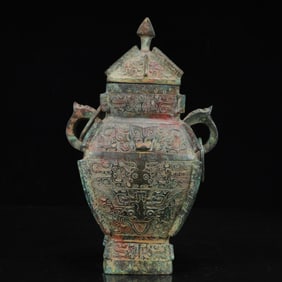 An Archaic Bronze Beast-Face Pattern Beast-Ears Vase