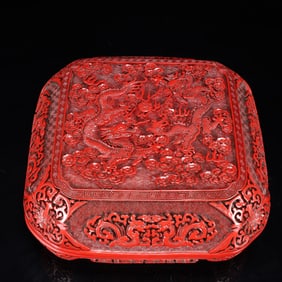 An Exquisite Carved Red Lacquer Auspicious Cloud and Dragon Pattern Box with Cover