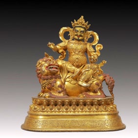 A Solemn Gilt Bronze Statue of Mammon Rides the Lion