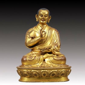 A Solemn Gilt Bronze Statue of Guru