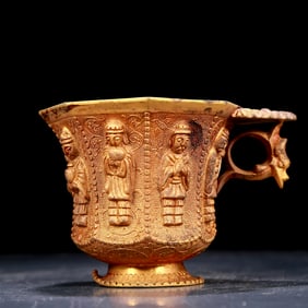 An exquisite gilt bronze figure cup