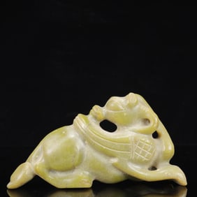 An Archaic Hongshan Culture Yellow Jade Animal Ornament