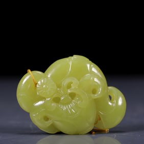 An Exquisite Yellow Jade Buffalo Pendant