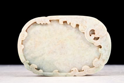 An exquisite jade inkstone with auspicious animal patterns