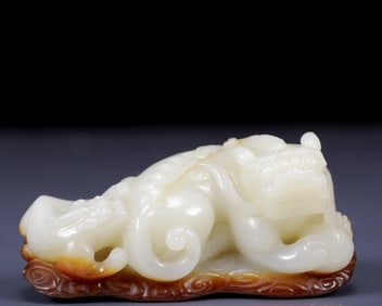 An Exquisite White Jade Auspicious Beast Ornament