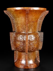An Exquisite White Jade Beast-Face Pattern Goblet