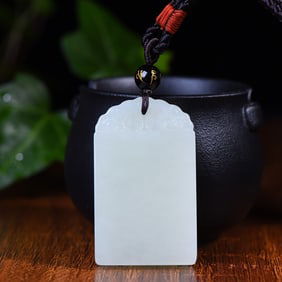 An Exquisite White Jade Pendant
