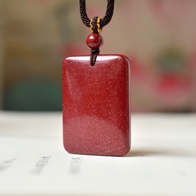 An Exquisite Cinnabar Pendant