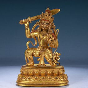 A Solemn Gilt Bronze Buddha Statue