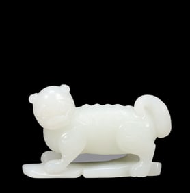 An Exquisite White Jade Lion Ornament