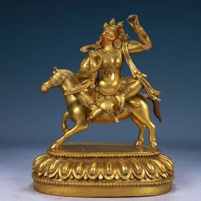 A Solemn Gilt Bronze Statue of Mammon Rides the Horse