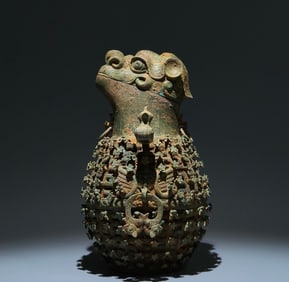 An Archaic Bronze Plum Blossom Pattern Bird-Ears Beast-head Cover Pot