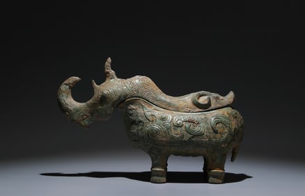 An Archaic Bronze Auspicious Beast-Shaped Food Vessel,With Inscription