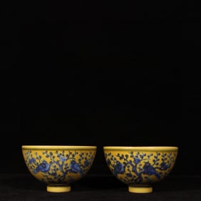A Pair of Exquisite Yellow Glazed Blue and White Flower and Bird Pattern Cups