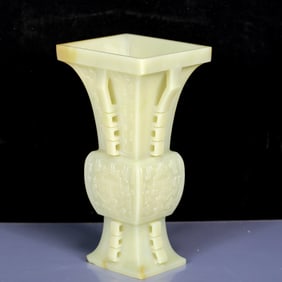 An Exquisite White Jade Beast-Face Pattern Vase