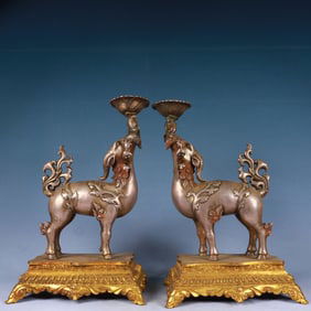 A Pair of Exquisite Gilt Bronze Buffalo-Shaped Candlesticks