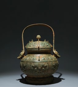 An Archaic Bronze Beast-Face Pattern Ewer