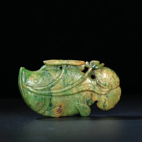 An Exquisite Jadeite Fish Hand Piece