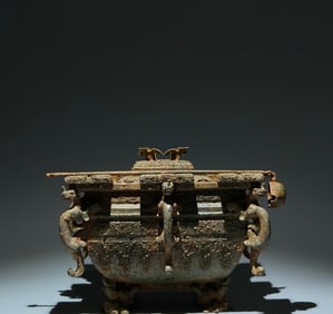 An Archaic Bronze Hollow Chi-Dragon Pattern Four Legs Ice vessel