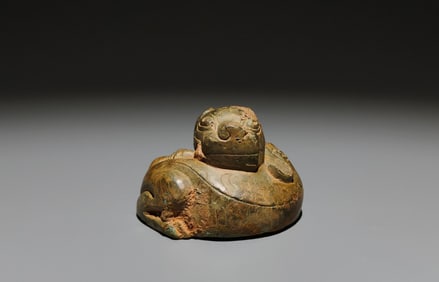 An Archaic Bronze Tiger Ornament