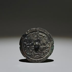 An Archaic Bronze Flower Pattern Round Mirror
