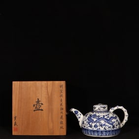 An Exquisite Blue and White Lotus and Dragon Pattern Ewer