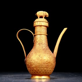 An exquisite gilt bronze ewer with floral and dragon patterns