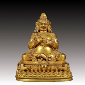 A solemn gilt bronze Vajra statue