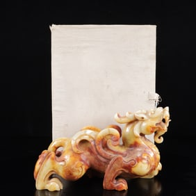 An Exquisite White Jade Auspicious Beast Ornament