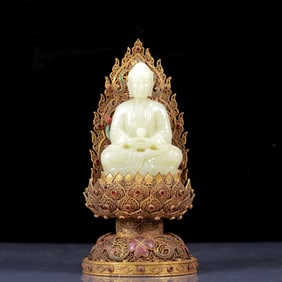 An Exquisite White Jade Sakyamuni with Gilt Bronze Inlaid Gems Base