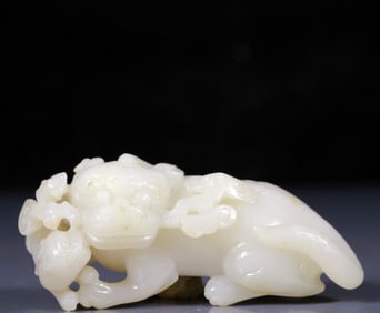 An Exquisite White Jade Auspicious Beast Ornament