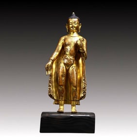 A Solemn Gilt Bronze Statue of Sakyamuni