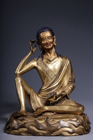 A Rare Gilt Bronze Statue of Guru