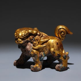 A Rare Gilt Bronze Lion Ornament