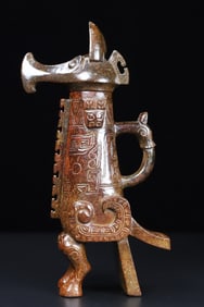 An Exquisite Archaic Jade Phoenix Zun