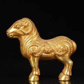 An Exquisite Gilt Bronze Beast-Face Pattern Sheep Ornament