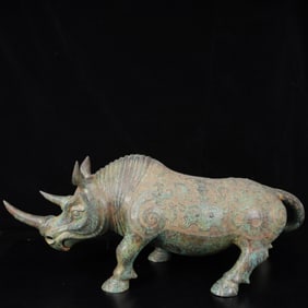 An Archaic Bronze Rhinoceros Zun
