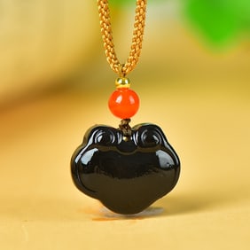 An Exquisite Black and White Jade Auspicious Cloud Pattern Pendant