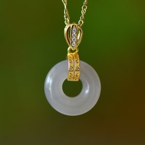 An Exquisite Sterling Silver-Gold Plated Inlaid Purple Jade Pendant