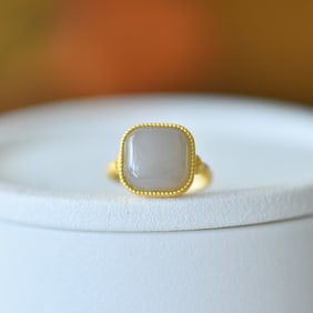 An Exquisite Sterling Silver-Gold Plated Inlaid White Jade Ring